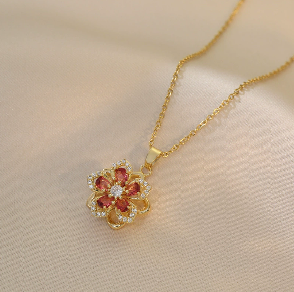 Collier pendentif rotatif à 360° en forme de fleur