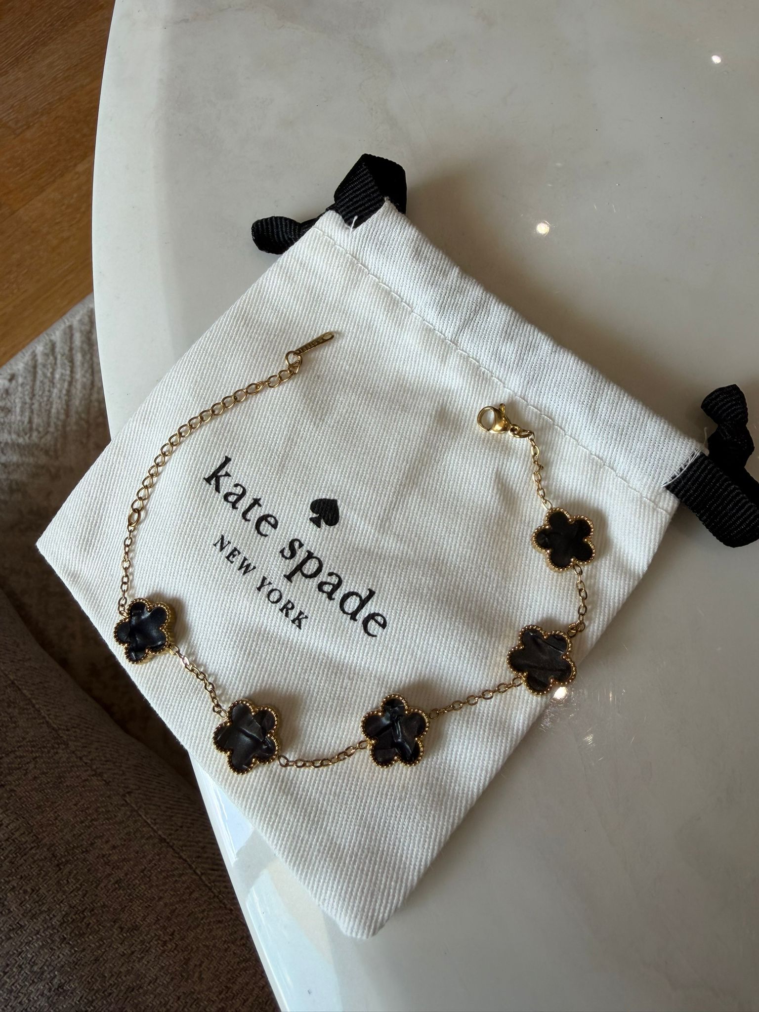Bracelet trèfle Kate spade marbre noir