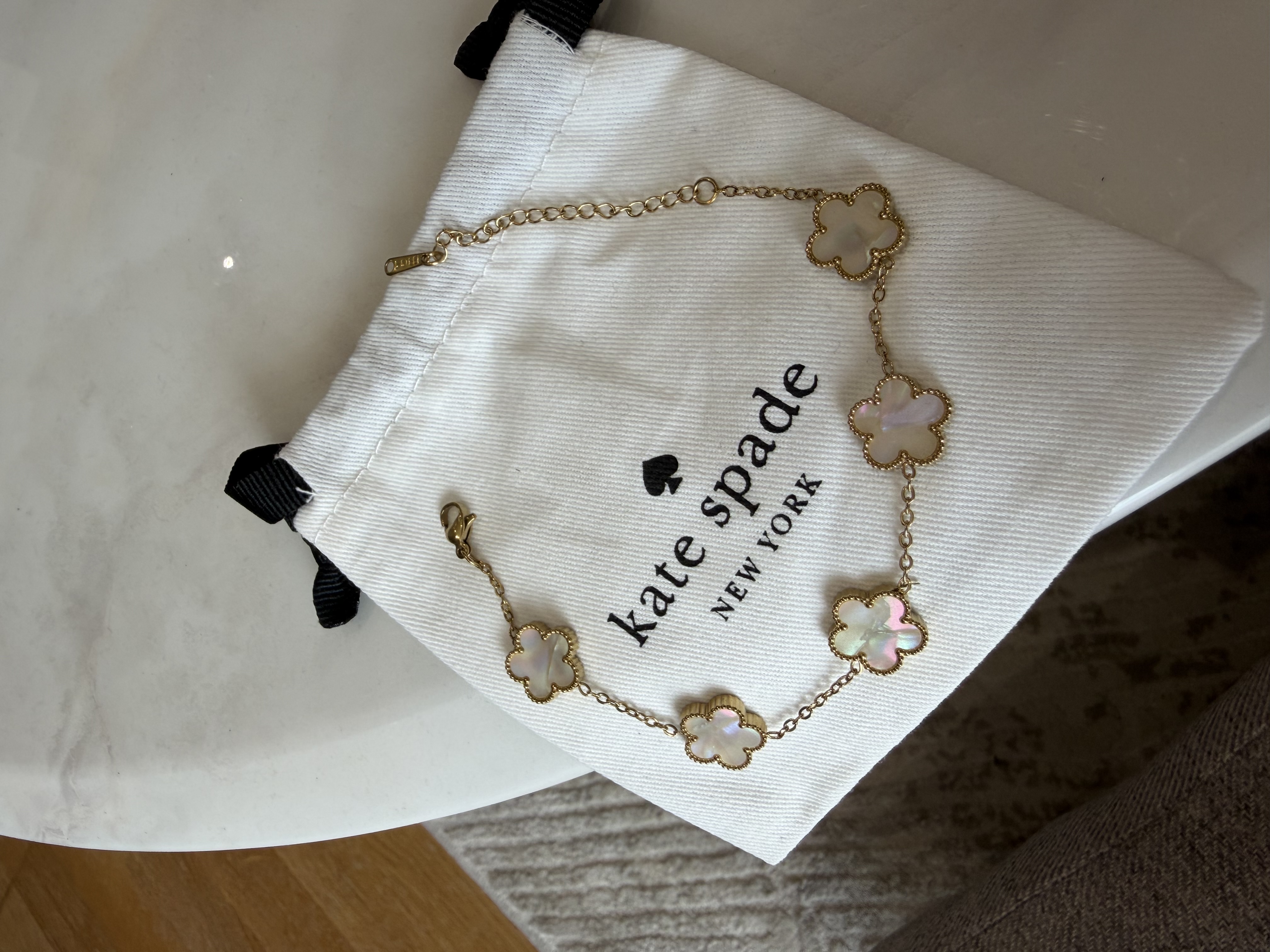 Bracelet trèfle marbré blanc kate spade pour femme
